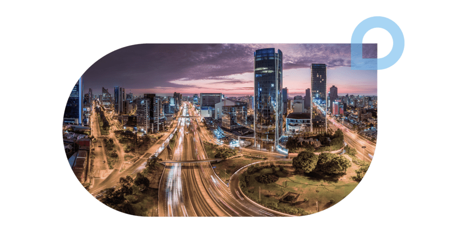 City landscape at night - Development Impact - Inter American Development Bank - IDB