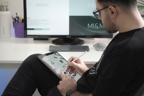 man working on laptop