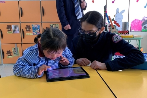Kids in ruraL areas with laptop
