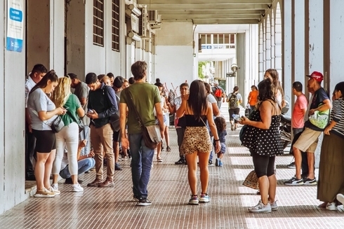 a group of people standing in a line