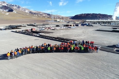 a group of people standing in a line