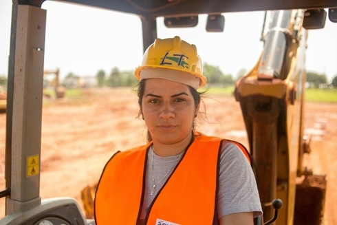 a person in a construction vehicle