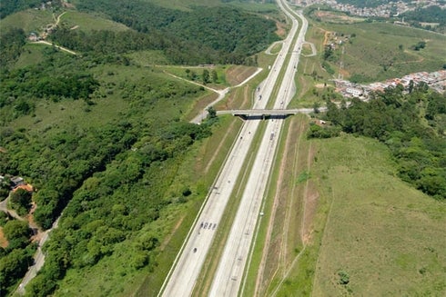 Panoramic view of a highway with cars on it