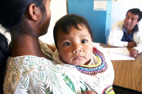 a person holding a baby