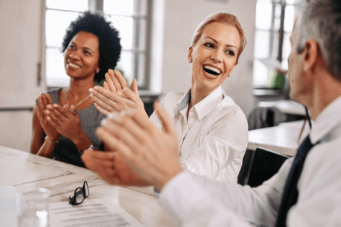 A group of people clapping Secure - Inter-American Development Bank - IDB