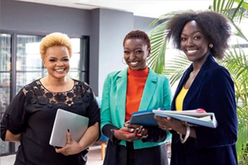 a group of women smiling