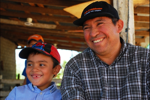 Man And Boy Smiling - Outreach - Inter American Development Bank - IDB