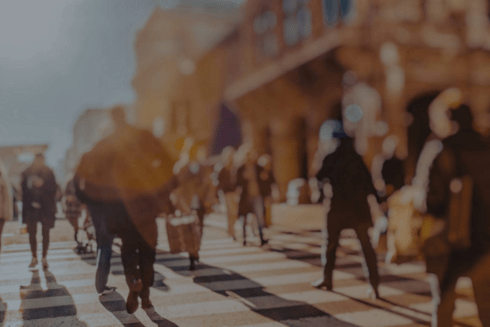 People walking on a street - Inter American Development Bank - Modernization of the State